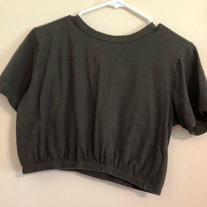 A Dark green crop top